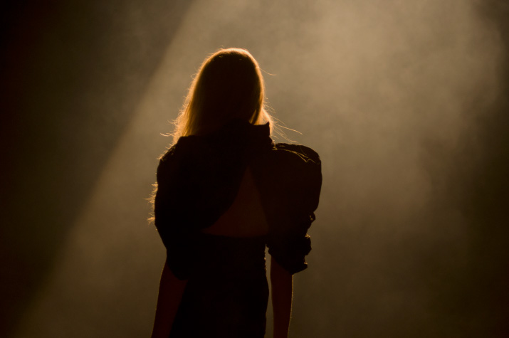 The Backlit silhouette Model in a black dress with large shoulders in A Degree Fahrenheit Spring 2012 Collection in Tokyo Fashion Week