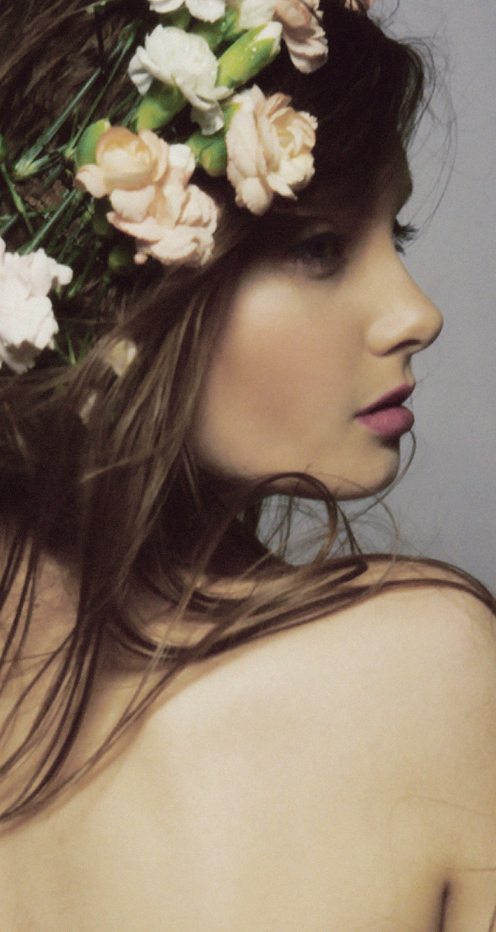 Beautiful inspiration friday photo of a girls back and profile with flowers in her hair